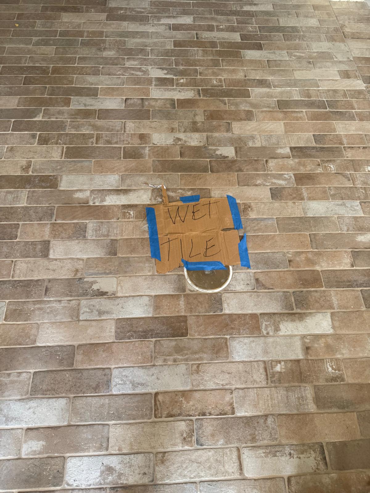 Slip-rated brick-look porcelain floor for an outdoor entry